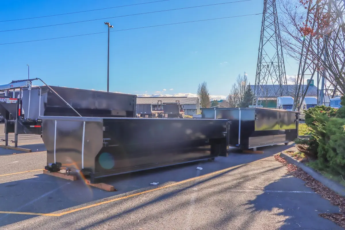 Roll-off dumpster ready for waste disposal at job site for 3 Yard Dumpster Rental in Villa Rica